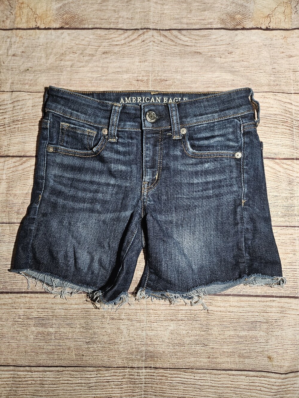American eagle Midi Next Level Stretch distressed ripped jean shorts